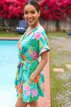 Load image into Gallery viewer, Tropical Vibes Turquoise Floral Surplice Tie Waist Romper
