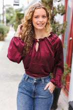 Load image into Gallery viewer, Holiday Vibes Burgundy Frill Detail Tie Neck Satin Top
