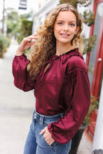 Load image into Gallery viewer, Holiday Vibes Burgundy Frill Detail Tie Neck Satin Top
